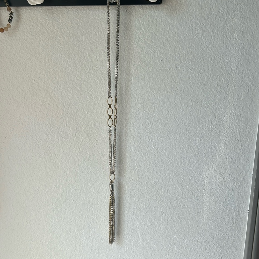 Long gold and silver colored necklace